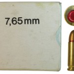  Упаковка венгерских патронов 1987 года выпуска и соответствующий ей патрон